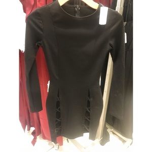 Black mini dress with thigh cutouts